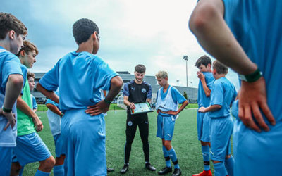 City Football Schools Tactical Huddle - City football development tours - Manchester